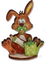 Baby Hare sitting with a baby bottle, light green, H 6 cm