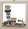 Wooden frame with driftwood coastal landscape lighthouse, clothesline, fishing net, dark blue, handmade