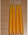 4 small candles yellow