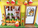 Bundle Holzdisplay Holzhaus gelb für austauschbar Motive + Sonderedition Osterset, 23x7x25,5 cm