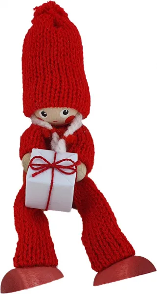 Weihnachtsmädchen sitzend mit Geschenk, Strickmütze, h 13 cm, rot