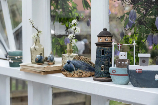 Det Gamle Apotek kleiner Kutter mit dänischer Flagge