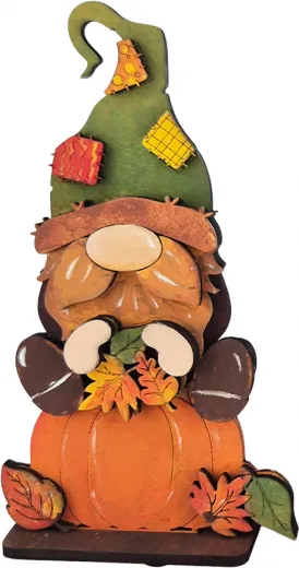 Herbstwichtel auf Kürbis sitzend mit grüner Flickenmütze, h 10 cm, Steckfigur Sebastian Holzkränze, handbemalt Herbstwichtel auf Kürbis sitzend mit grüner Flickenmütze, h 10 cm, Steckfigur Sebastian Holzkränze, handbemalt