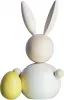Aarikka Osterhase weiß mit gelbem Ei H 16 cm finnische Osterdekoration