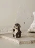 Dekorative Holzfigur Snow von Spring Copenhagen auf einer Eisscholle sitzend